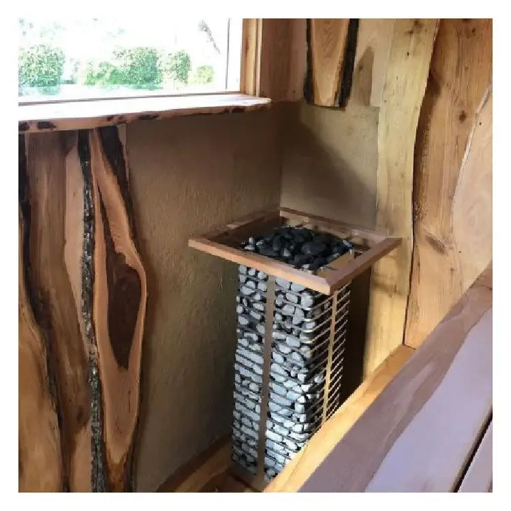 HUUM steel sauna heater - installed with safety rail